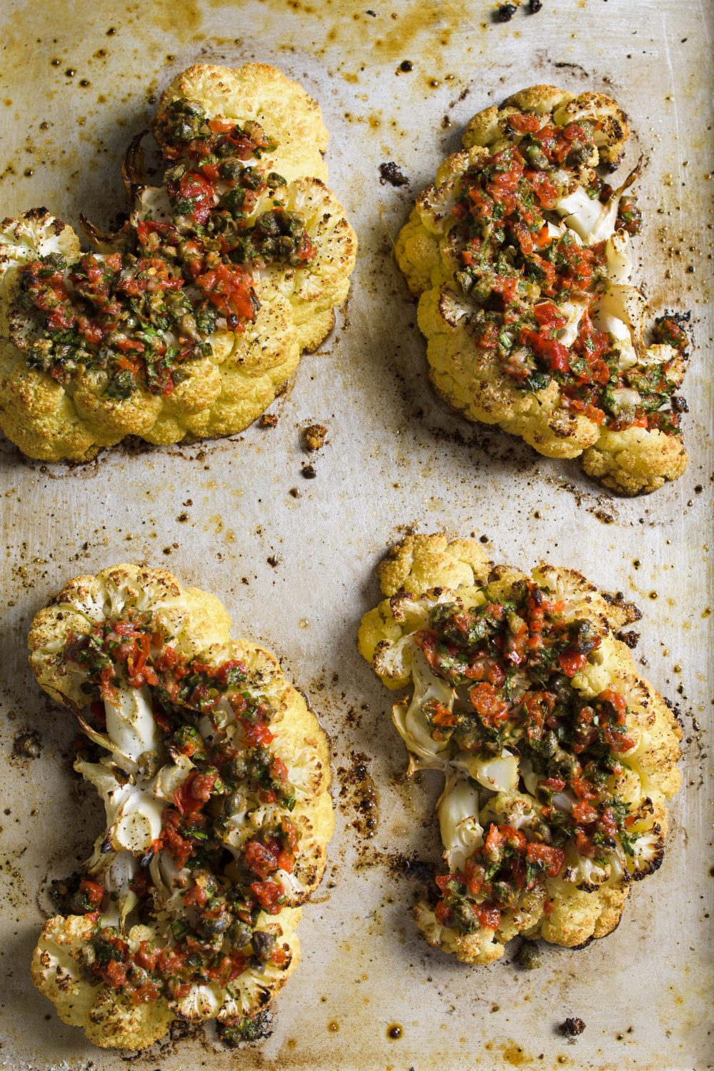 Cauliflower steaks pickled peppers capers parmesan v
