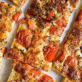mozzarella tomatoes pour pan pizza